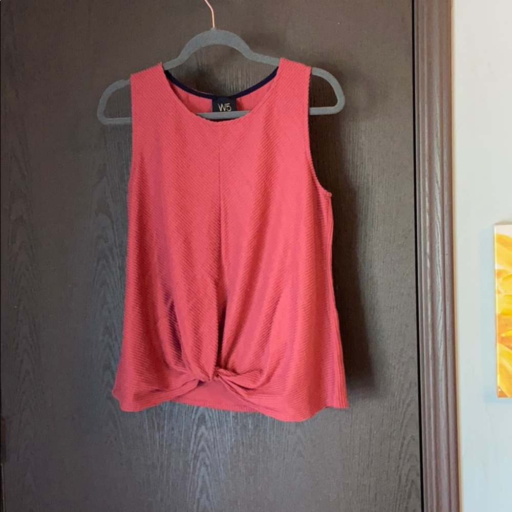 Rusty red tank with cute knot at the bottom